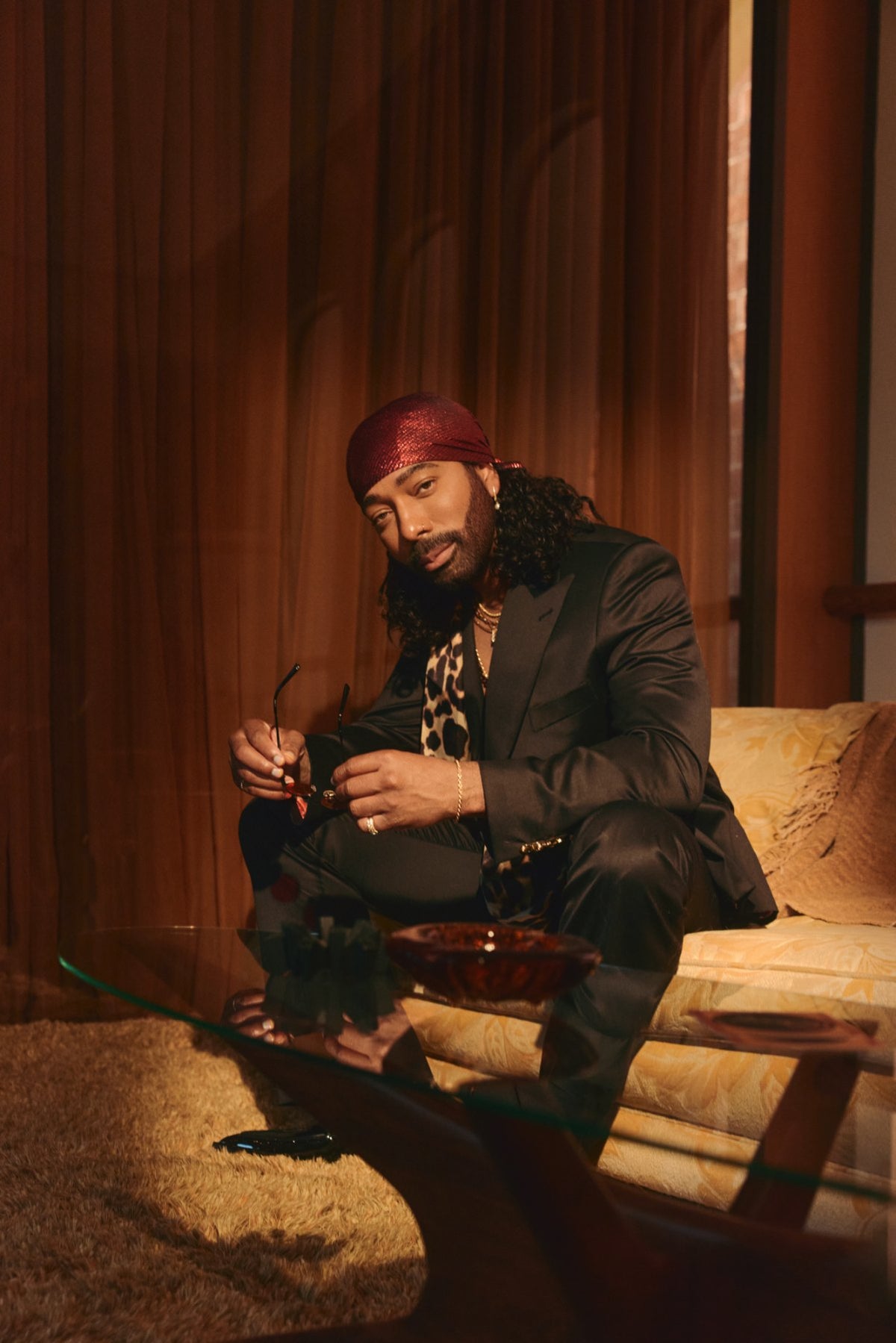 Rochone seated in a lounge